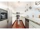 Modern kitchen with stainless steel appliances, granite countertops, and stylish lighting at 2499 Peachtree Ne Rd # 504, Atlanta, GA 30305