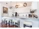 Modern kitchen with granite countertops, stainless steel appliances, and an island with seating at 2499 Peachtree Ne Rd # 504, Atlanta, GA 30305