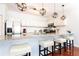 Modern kitchen with granite countertops, stainless steel appliances, and an island with seating at 2499 Peachtree Ne Rd # 504, Atlanta, GA 30305