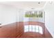 Bright living room with hardwood floors and large windows offering city views at 2499 Peachtree Ne Rd # 504, Atlanta, GA 30305
