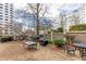Shared outdoor patio with seating and grill at 2499 Peachtree Ne Rd # 504, Atlanta, GA 30305