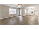 Spacious living area with hardwood floors and an open concept layout at 1187 Warm Spring Ct, Hampton, GA 30228