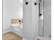 A bathroom featuring a tub, tile flooring, a shower, and gray wall at 5030 Mundy Dr, Cumming, GA 30028