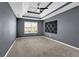 Bedroom with carpet, gray wall, window, and ceiling fan at 5030 Mundy Dr, Cumming, GA 30028