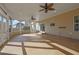 Large screened patio with ceiling fans and ample natural light at 5030 Mundy Dr, Cumming, GA 30028