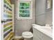 Small bathroom with shower and white vanity at 516 Fairlane Nw Cir, Atlanta, GA 30331