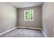Simple bedroom with gray walls and carpet at 516 Fairlane Nw Cir, Atlanta, GA 30331