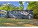 Gray house with steps leading to the entrance and a view of the backyard at 516 Fairlane Nw Cir, Atlanta, GA 30331