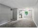 Spacious living room with gray walls and carpeted floors at 516 Fairlane Nw Cir, Atlanta, GA 30331