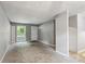 Bright living room featuring gray walls and carpet at 516 Fairlane Nw Cir, Atlanta, GA 30331