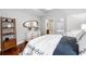 Spacious bedroom with hardwood floors and en-suite bathroom at 1080 Peachtree Ne St # 3309, Atlanta, GA 30309