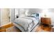 Comfortable bedroom with hardwood floors and en-suite bathroom at 1080 Peachtree Ne St # 3309, Atlanta, GA 30309