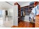 Custom closet with shelving, drawers, and hanging space at 1080 Peachtree Ne St # 3309, Atlanta, GA 30309