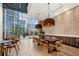 Community room features a large table and access to an outdoor patio at 1080 Peachtree Ne St # 3309, Atlanta, GA 30309