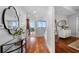Bright hallway with hardwood floors and access to rooms at 1080 Peachtree Ne St # 3309, Atlanta, GA 30309