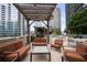 Relaxing rooftop lounge with pergola and seating at 1080 Peachtree Ne St # 3309, Atlanta, GA 30309