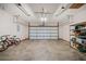 Bright two-car garage with automatic door and plenty of space for storage and projects at 175 Highland Cir, Mcdonough, GA 30253