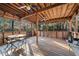 Spacious screened porch offers outdoor enjoyment with ceiling fans and room for dining at 175 Highland Cir, Mcdonough, GA 30253