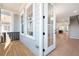 Open floorplan showcasing the transition from the porch to the living area and staircase at 1979 Flying Scotsman Dr # 16, Kennesaw, GA 30144