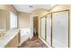 Bathroom featuring a soaking tub and walk-in shower at 1120 Graystone Xing, Alpharetta, GA 30005