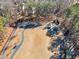 An aerial view of a park with a walking path and open green space at 1120 Graystone Xing, Alpharetta, GA 30005