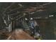 Unfinished basement with low ceilings, exposed ductwork, and stairs at 1142 Cahaba Dr, Atlanta, GA 30311