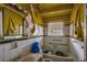 Bathroom needs renovation. Features a bathtub and sink at 1142 Cahaba Dr, Atlanta, GA 30311