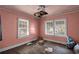 Needs renovation. Bedroom with hardwood floors and windows at 1142 Cahaba Dr, Atlanta, GA 30311