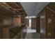 Hallway with wood paneling and access to other rooms at 1142 Cahaba Dr, Atlanta, GA 30311