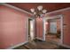 Living room with hardwood floors and multiple doorways at 1142 Cahaba Dr, Atlanta, GA 30311
