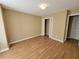 Well-lit bedroom with wood floors and a large closet at 1745 Collines Sw Ave, Atlanta, GA 30331