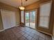 Breakfast nook with tile floor and sliding glass doors to deck at 1745 Collines Sw Ave, Atlanta, GA 30331