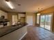 Kitchen with breakfast nook and sliding door to deck at 1745 Collines Sw Ave, Atlanta, GA 30331