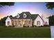 Elegant two-story home with gray shutters and a welcoming front entrance at 190 Carl Sanders Dr, Acworth, GA 30101