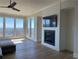 Gathering room with fireplace and lake views at 190 Carl Sanders Dr, Acworth, GA 30101