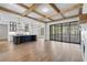 Bright and airy living room with exposed wooden beams and a cozy fireplace at 190 Carl Sanders Dr, Acworth, GA 30101