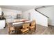 Dining area with wooden table and chairs near kitchen at 2116 Stillhaven Pl, Douglasville, GA 30135