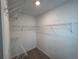 Large walk-in closet with wire shelving at 2116 Stillhaven Pl, Douglasville, GA 30135