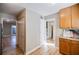 Modern kitchen with island and access to other rooms at 3312 Northcrest Rd # A, Atlanta, GA 30340