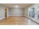 Living room with hardwood floors and access to patio at 3312 Northcrest Rd # A, Atlanta, GA 30340