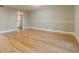 Spacious living room with hardwood floors and access to patio at 3312 Northcrest Rd # A, Atlanta, GA 30340