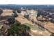 Wide aerial view of the scenic Golf Course, showing lush fairways and winding creeks at 333 Gardens Of Harmony Dr, Canton, GA 30115