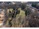 Aerial view of undeveloped land showing a spacious lot with mature trees at 333 Gardens Of Harmony Dr, Canton, GA 30115