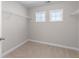 Spacious walk-in closet with carpet floor and windows for natural light at 333 Gardens Of Harmony Dr, Canton, GA 30115