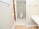 Small bathroom with toilet and shower at 407 Coleraine Se, Smyrna, GA 30080