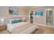 Virtually staged bedroom with ocean view art at 407 Coleraine Se, Smyrna, GA 30080