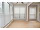 Bright dining area with large windows and light wood floors at 407 Coleraine Se, Smyrna, GA 30080