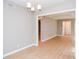 Dining area with hardwood floors and access to adjacent living space at 407 Coleraine Se, Smyrna, GA 30080