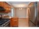 Kitchen with stainless steel appliances and wood cabinets at 407 Coleraine Se, Smyrna, GA 30080