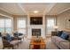 Living room with fireplace, hardwood floors, and stylish seating at 407 Coleraine Se, Smyrna, GA 30080